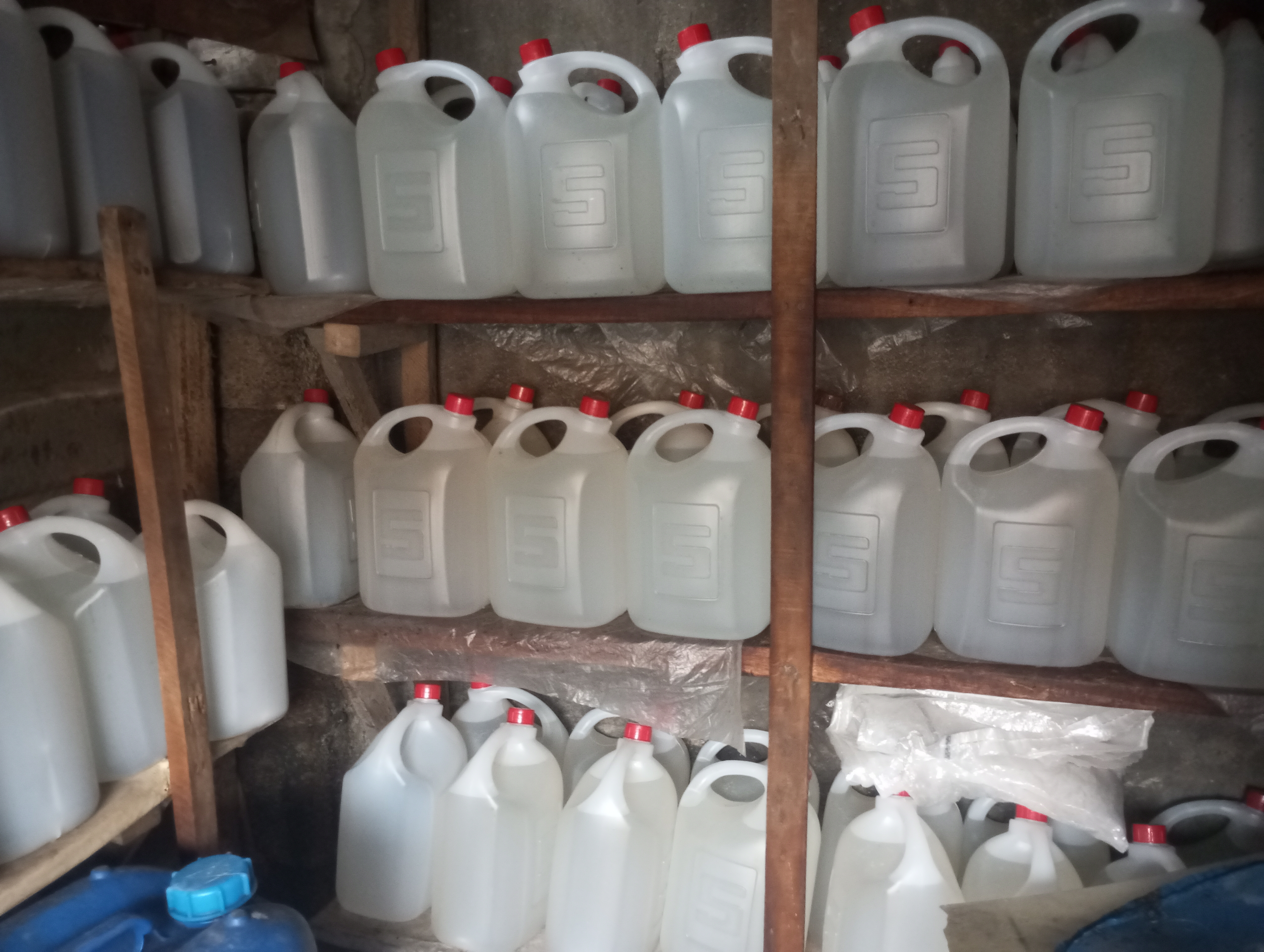 Rows of electrolyte containers in storage